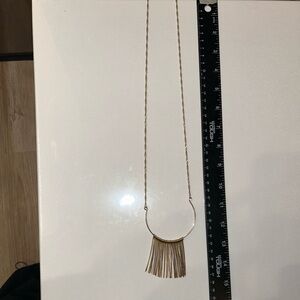 Stunning necklace featuring a unique fringe design
